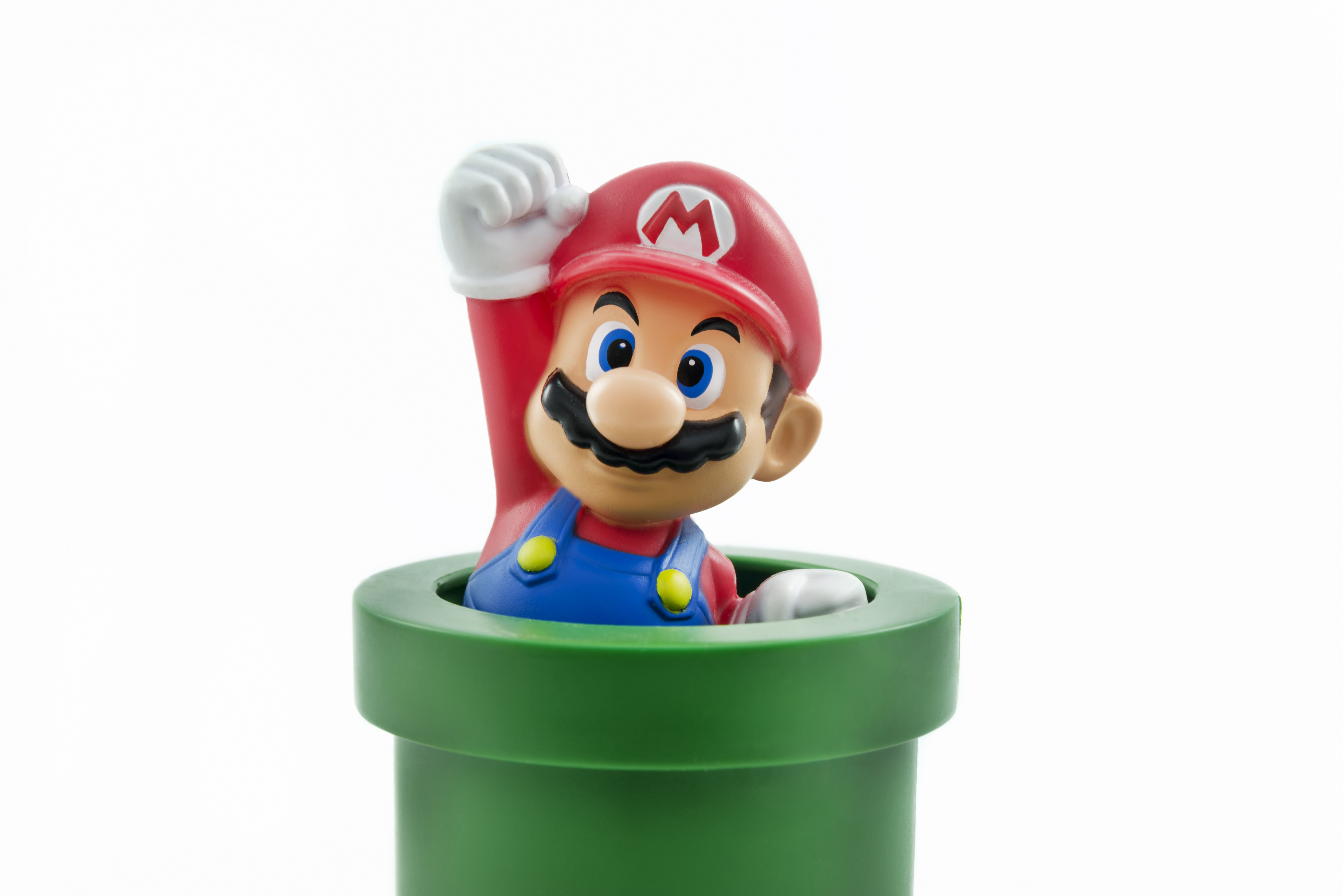 Super Mario jumping out of a tube