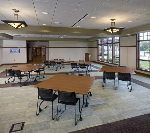 large community room with tables and chairs