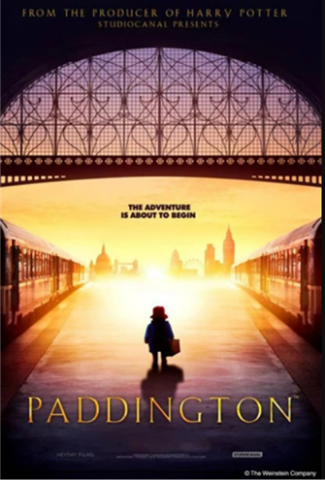 Movie poster for Paddington showing a bear walking down a road