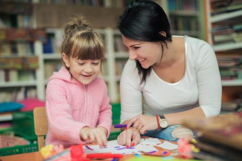 Girl and woman making art